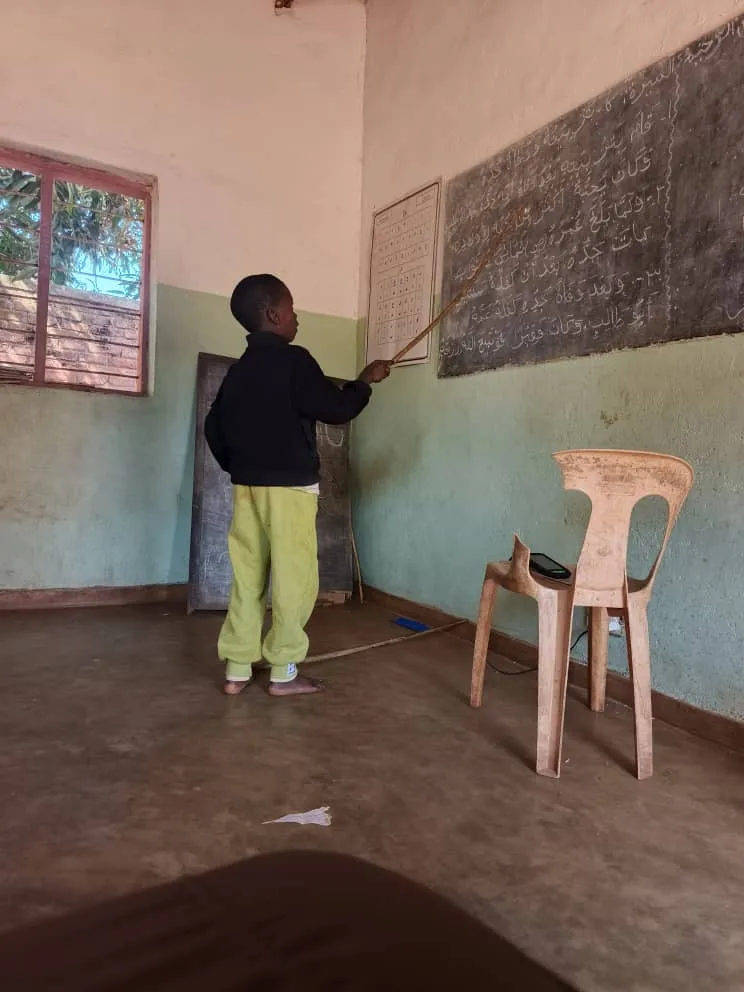 A teacher guiding his students through the text.